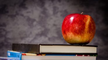 An apple on a stock of books, Welcome new CSA Board President