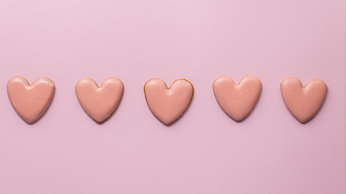 5 pink hearts on a pink background
