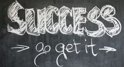 chalkboard with "success go get it" written on it in white chalk