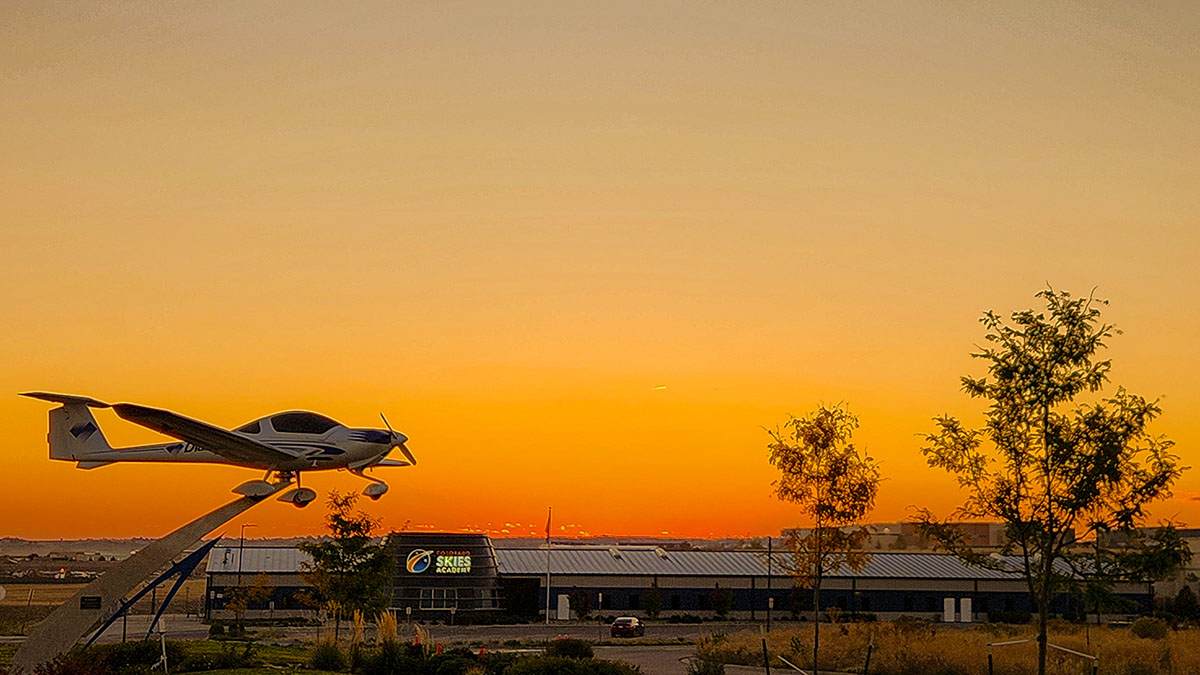 CSA building with orange sky